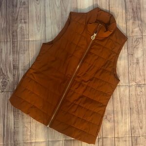 Michael Kors puffer vest, burnt orange, great condition.